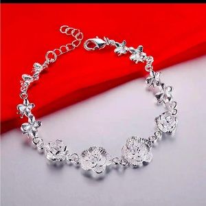 Gorgeous 925 Sterling Silver bracelet with Roses and tiny butterflies!